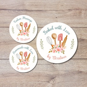 May include: Three round white stickers with a floral design and baking utensils. The stickers say "Custom Message", "Baked with Love", and "Homemade with Love". All three stickers say "by Christina".