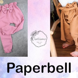 Puede incluir: Pantalones de bebé rosas con un gran lazo en la cintura. Los pantalones tienen una cintura y puños fruncidos. La imagen también incluye el texto "Paperbell" en negrita.