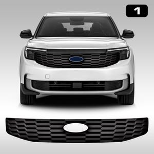 Puede incluir: Un SUV blanco con una parrilla negra y un emblema ovalado azul. La parrilla tiene un diseño de panal. Una parrilla negra separada con un óvalo blanco debajo.