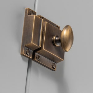 Trava elegante para armário em latão maciço com giro oval, estética atemporal, elevando a aparência de qualquer armário, gaveta, gabinete