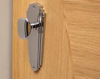 Art Deco Solid Brass High end Door Knob or door handle on Stepped Back Plate, a chunky heavy weight item, a statement . elegant