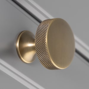 The Berlin Knurled Cupboard Knob Solid Brass classically sophisticated, perfect for draws , cabinets , dressers , wardrobes , pvd finish