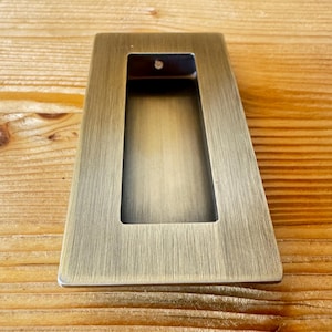 Rectangular Flush Pull handle  stainless steel , ideal for us on sliding doors , pocket doors , wardrobes or cupboards , low profile