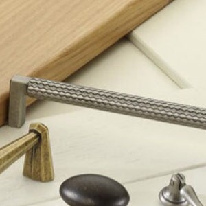 Paxon Cabinet Pull handle The expertly designed patterned handle adds a little texture and while being silky smooth, draws wardrobes