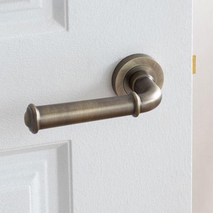 Classic traditional door handle , lever on round rose, Ideal for both traditional and modern interiors