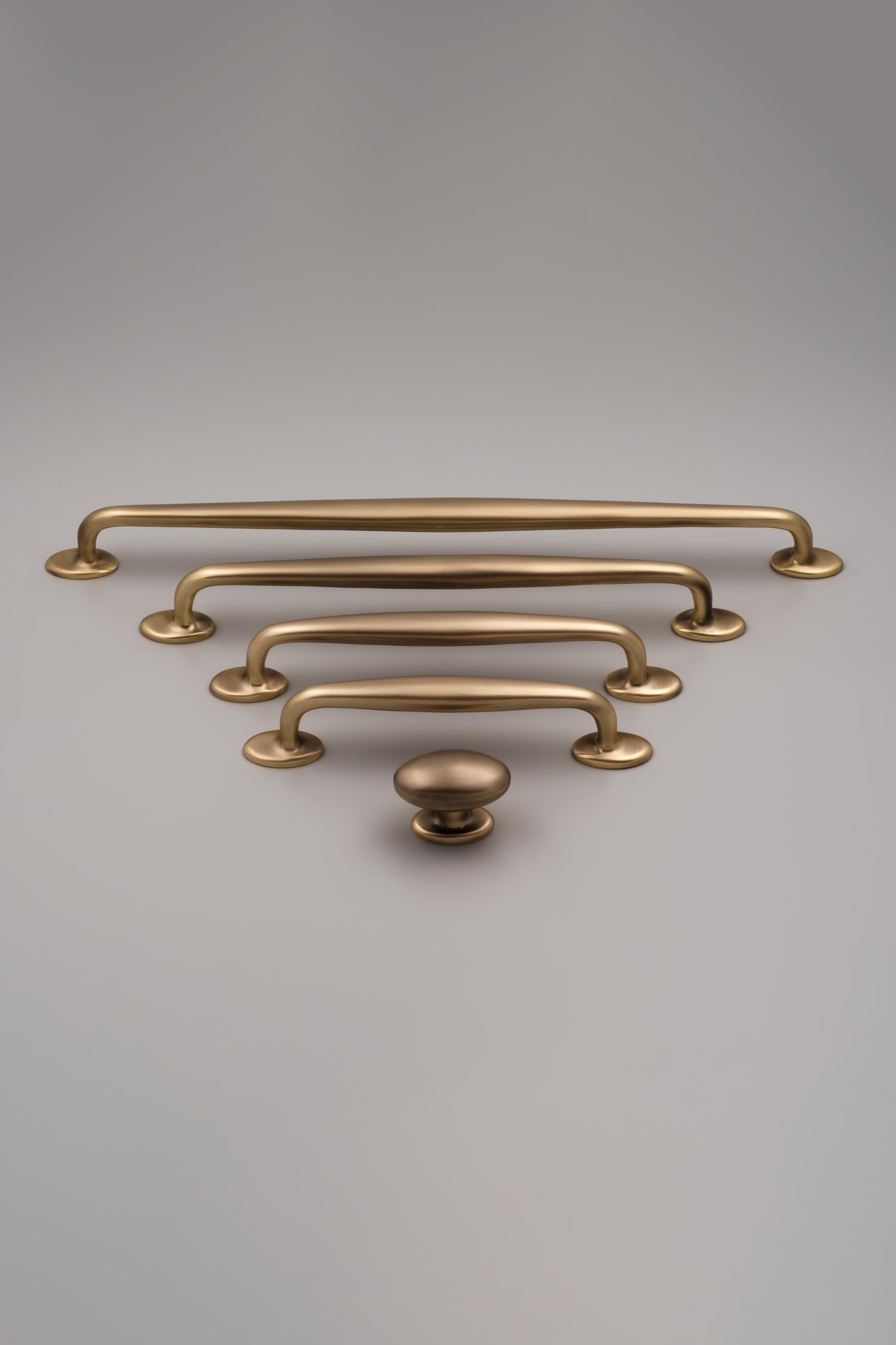 The Ashley Cabinet Pull Handle, Crafted from solid brass a simple…