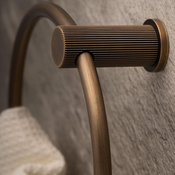 Elegant Brass Towel ring with stunning lined reeded pattern adding texture. high end product to hold your towels. modern bathroom accessory