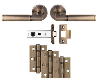 May include: Antique brass door hardware set with two door handles, a latch, and three pairs of hinges. The hinges are labeled "E68S".