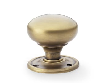 Pair of Solid Brass Door knobs , Traditional Mushroom shaped , separate rode to allow mortice or rim fixing.