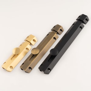 Stylish Surface Brass Bolt Lock, Flat sliding barrel offering more security than a conventional barrel bolt. Smooth operation. Heavy weight