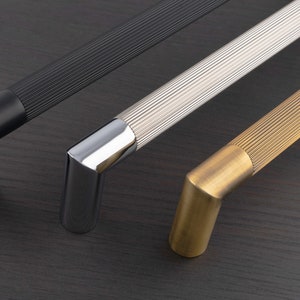 Mitered Knurled Door pull handle. made from stainless steel , available as singles or back to back . perfect for barn doors or swing doors
