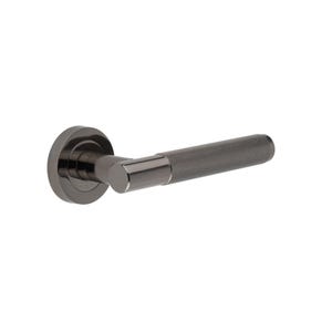 May include: A dark gray door handle with a round base and a textured, cylindrical grip. The handle has a modern design and is made of metal. The finish is a matte, dark gray color.