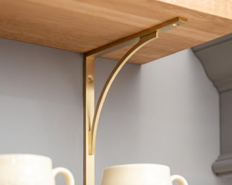 Soporte de estante de latón macizo, resistente pero elegante, disponible en varios acabados con un acabado PVD de 25 años