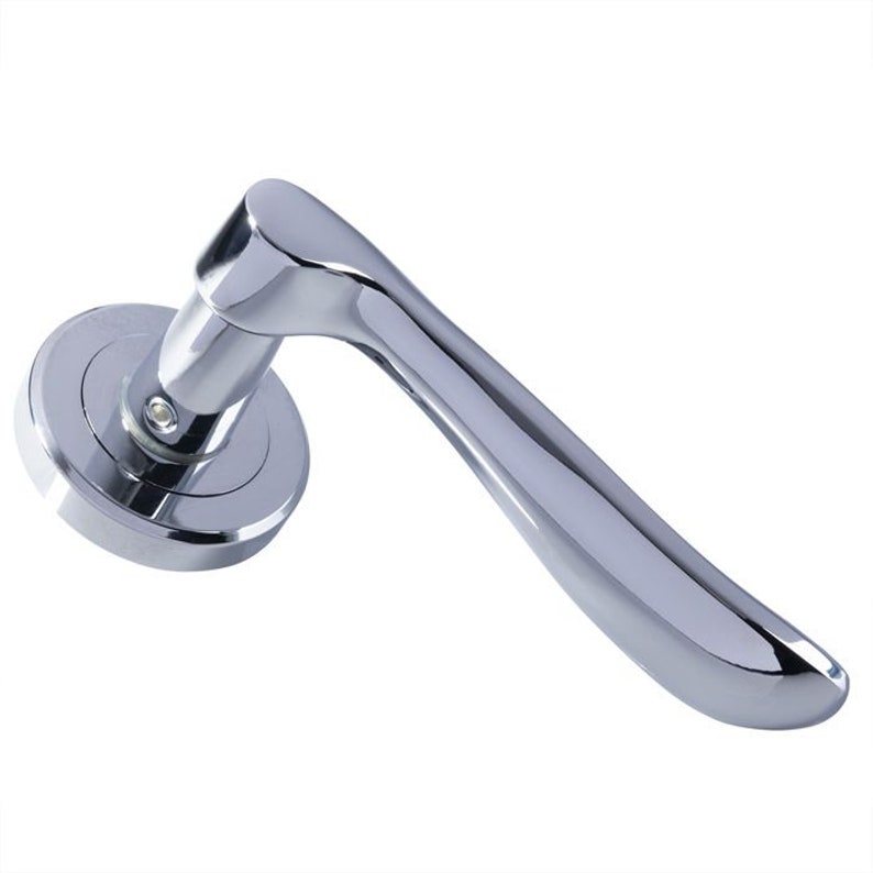 May include: A polished chrome door handle with a lever design. The handle has a round base and a long, curved lever.