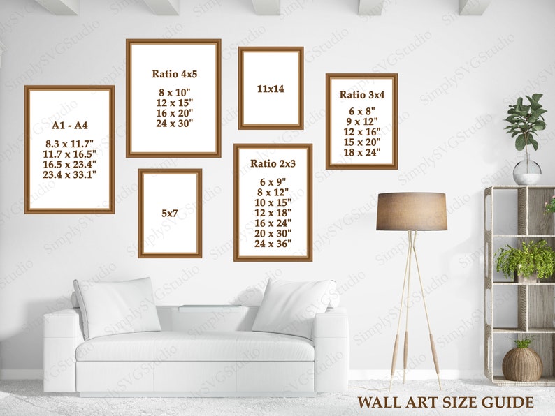 May include: A wall art size guide with different frame ratios and dimensions in inches. The guide includes ratios like 4x5, 3x4, 2x3, 5x7, and 11x14. The guide is displayed on a white wall with a white couch and a lamp in front of it.