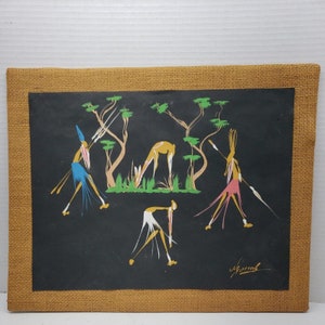 May include: A framed painting on burlap depicting a stylised scene of African hunters with spears hunting a gazelle in a green forest. The painting is signed "Vincent" in the bottom right corner.