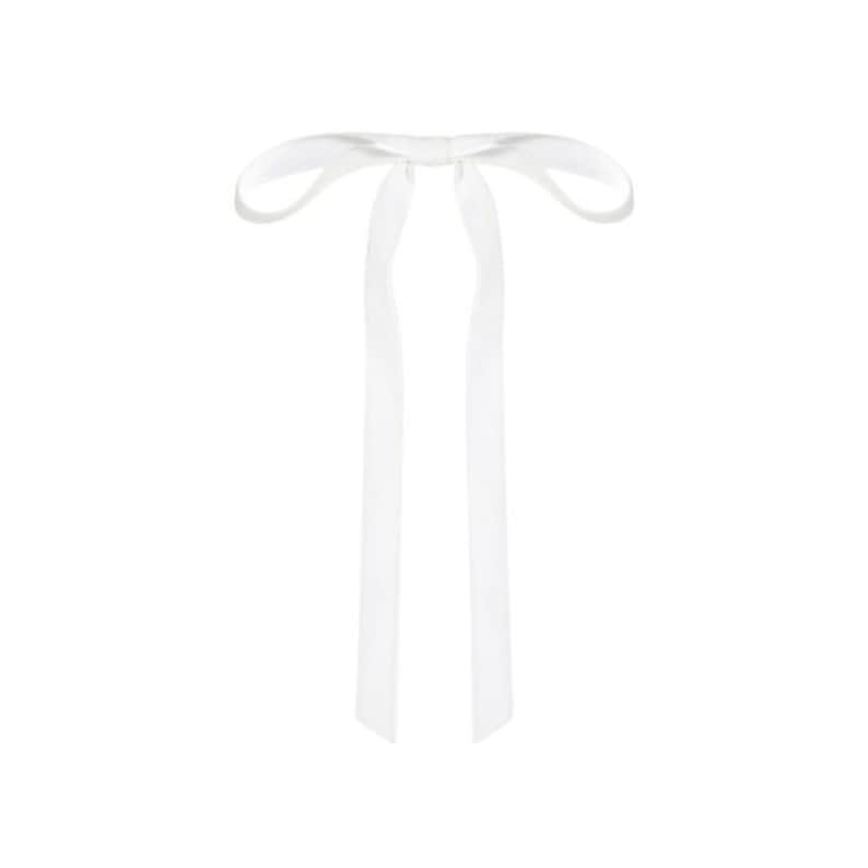 a velvet hair bow made with thin velvet ribbon in a long tail design attached to a french barrette clip, shown as a long tail hair bow suitable as a hair bow for women and hair bows for girls. the shape works as a ribbon hair bow or hairpin bow clip, styled like a ponytail holder bow or long ribbon bow. ideal as a christmas hair bow and fits gifting needs such as gift for her or gift for girl.