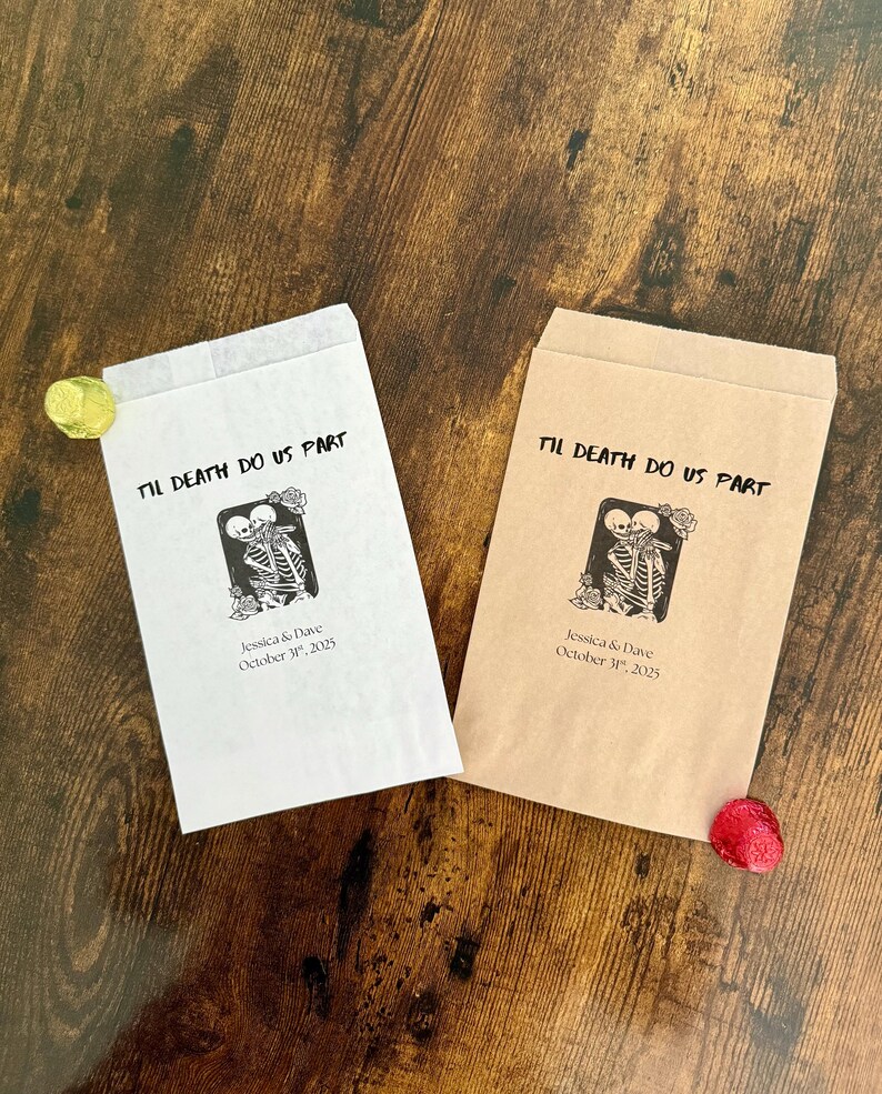 May include: Two paper favor bags with the text "Til Death Do Us Part" and a skeleton couple graphic. One bag is white, the other is tan. The bags are personalized with a name and date.