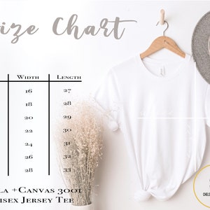 May include: A white Bella + Canvas 3001 Unisex Jersey Tee hanging on a wooden hanger, next to a gray hat. A size chart shows measurements in inches for XS to 3XL sizes. The text "Chelsea Gets Crafty" is in a circle.