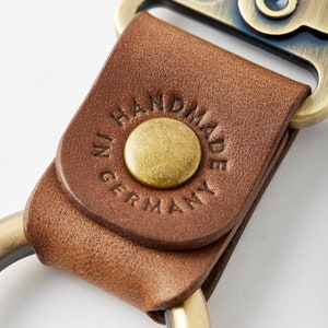 Genuine leather keychain with double-sided snap fastener