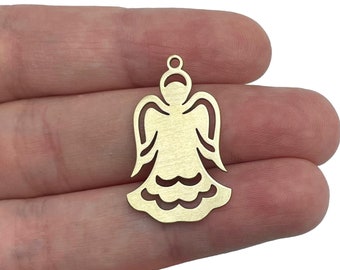 May include: Gold metal angel charm with a cutout design. The angel has wings, a halo, and a flowing gown.
