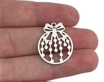 May include: Silver metal ornament charm with a bow and a design of hanging lights.