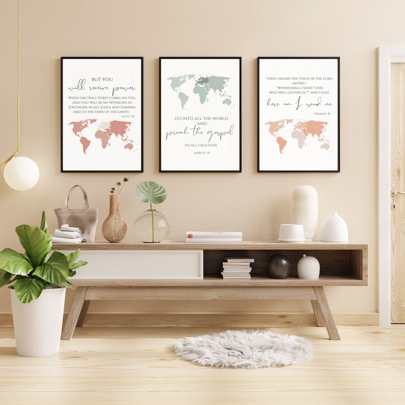 May include: Three framed prints with world maps and bible verses. The top print says "But you will receive power when the Holy Spirit comes on you, and you will be my witnesses in Jerusalem, and in all Judea and Samaria, and to the ends of the earth." The middle print says "Go into all the world and preach the gospel to all creation." The bottom print says "Then I heard the voice of the Lord saying, 'Whom shall I send and who will go for us?' And I said, 'Here am I. Send me.'"