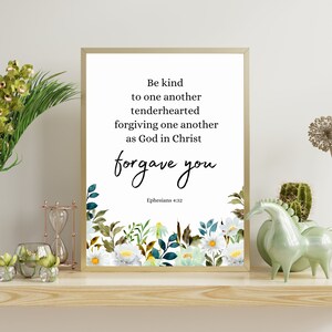 Peut inclure: Une impression d'art imprimable blanche avec une bordure florale et le texte "Be kind to one another tenderhearted forgiving one another as God in Christ forgave you Ephesians 4:32".