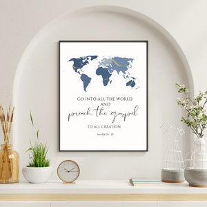 May include: A blue and gold world map print with the text "Go into all the world and preach the gospel to all creation. Mark 16:15".