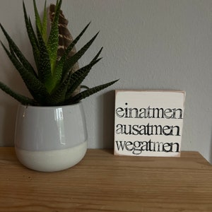 Wooden sign with the saying 'Inhale, exhale, breathe away' - inspiring wall decoration with positive affirmations - positive thinking sayings souvenirs