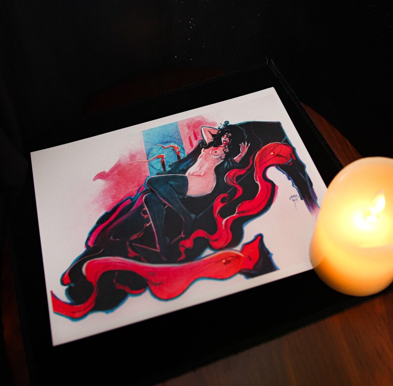 May include: A digital illustration of a woman with long dark hair lying on a red and pink swirling fabric. The woman is wearing a black dress and has a red and pink fabric draped over her body. The background is a blue and white watercolour wash.