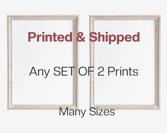 May include: Two white picture frames with a wood-like finish. The frames are empty and have a white background. The text "Printed & Shipped" and "Any SET OF 2 Prints" is printed in red on the frames. The text "Many Sizes" is printed in black below the frames.
