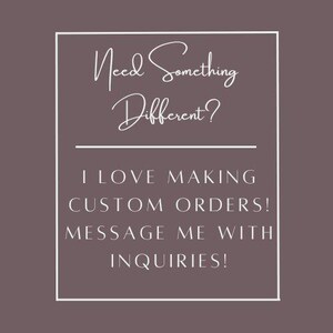 May include: A rectangular graphic with a dark mauve background and a thin white border. The text reads: Need Something Different? I LOVE MAKING CUSTOM ORDERS! MESSAGE ME WITH INQUIRIES! The top line is in a script font, while the rest is in sans-serif.