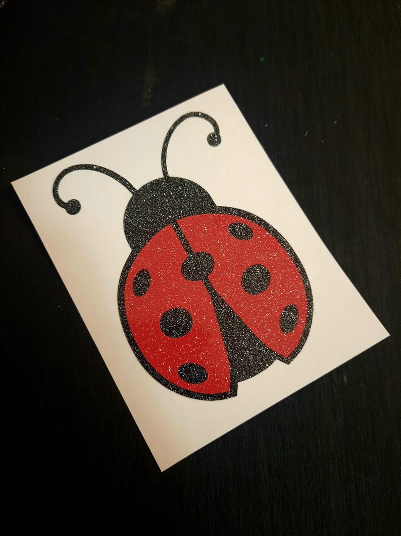 Lady Bug Decal with a glittery black body and glittery red wings