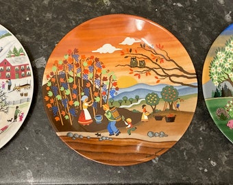 Three season-related naive painting decorative plates