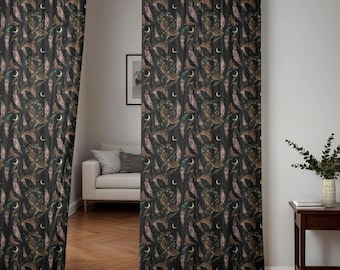 May include: Dark, patterned curtains with a repeating design of moths, flowers, and crescent moons. The color palette includes black, brown, pink, and green. The curtains are hanging in a room with a white wall and a wooden floor.