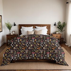 May include: A dark brown blanket with a repeating pattern of mushrooms, leaves, and insects. The blanket is spread over a bed with a wooden headboard and nightstands. The pattern includes red, yellow, and green elements.
