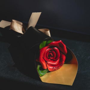 A handmade forever rose engraved with your special date. 3rd anniversary
