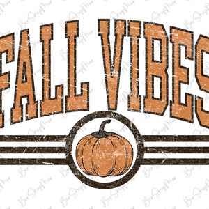 May include: A distressed orange and brown graphic with the words "FALL VIBES" in a collegiate font. A pumpkin is centered below the text, within a black circle and two horizontal lines. The design is on a white background.