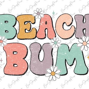 May include: A retro-style graphic design with the text "Beach Bum" in colorful, outlined letters. The letters have a distressed, vintage look and are surrounded by white daisies.