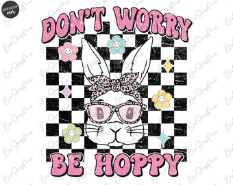 May include: A white bunny with pink sunglasses and a pink and leopard print headband on a black and white checkered background. The text "Don't Worry Be Hoppy" is in pink letters.