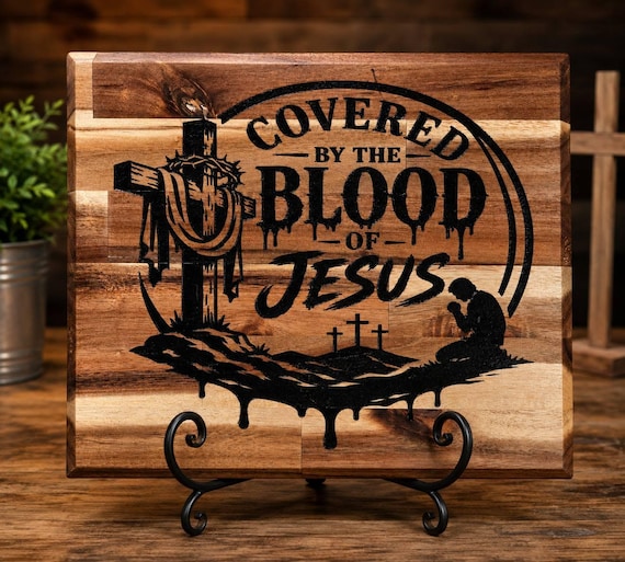 Covered By The Blood Of Jesus Cutting Board