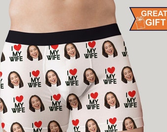 May include: White boxer briefs with a repeated pattern of a woman's face and the text "I love my wife" with a red heart.