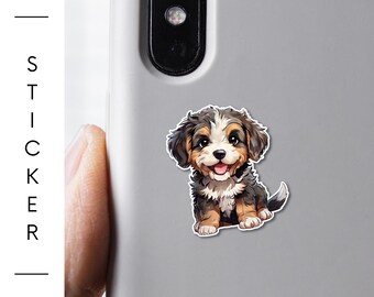 May include: A laminated vinyl sticker featuring a watercolor illustration of a Bernese Mountain Dog puppy. The sticker is affixed to a gray phone case. The sticker has the text "BarkRebels" and "STICKER" on the left side.
