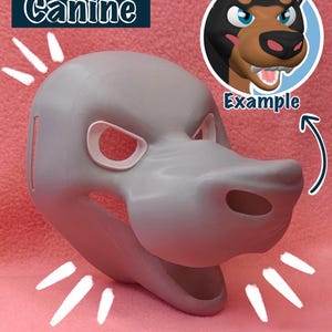 May include: A gray, unpainted, 3D printed canine mask with a large, open mouth. The mask is on a pink surface. The text "Canine" is in the upper left corner of the image. The text "Example" is in the upper right corner of the image. The text "*BASE ONLY" is in the lower right corner of the image. The text "ETSY > SLAUVIK" is in the lower left corner of the image.