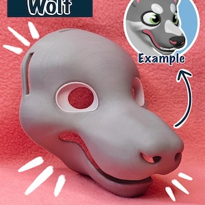May include: Gray wolf fursuit base, unpainted, with a white eye hole and a textured surface. The base is for a wolf fursuit and is made of a durable material. The base is unpainted and ready to be customized. *BASE ONLY* is written at the bottom of the image.