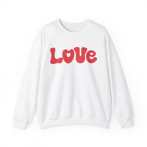 LOVE Unisex Heavy Blend™ Crewneck Sweatshirt