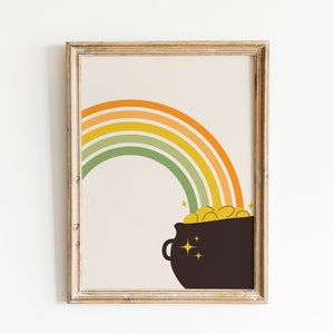 May include: A framed print of a rainbow with a pot of gold at the end. The rainbow is made up of orange, yellow, green, and blue stripes. The pot of gold is black with gold coins inside.
