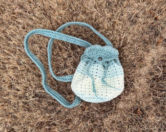 Homemade crochet mini drawstring backpack