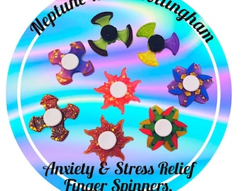 May include: A collection of eight colorful resin fidget spinners with different designs. The spinners are arranged in a circle on a blue and purple background. The text "Neptune Resin Nottingham" and "Anxiety & Stress Relief Finger Spinners." is written around the spinners.